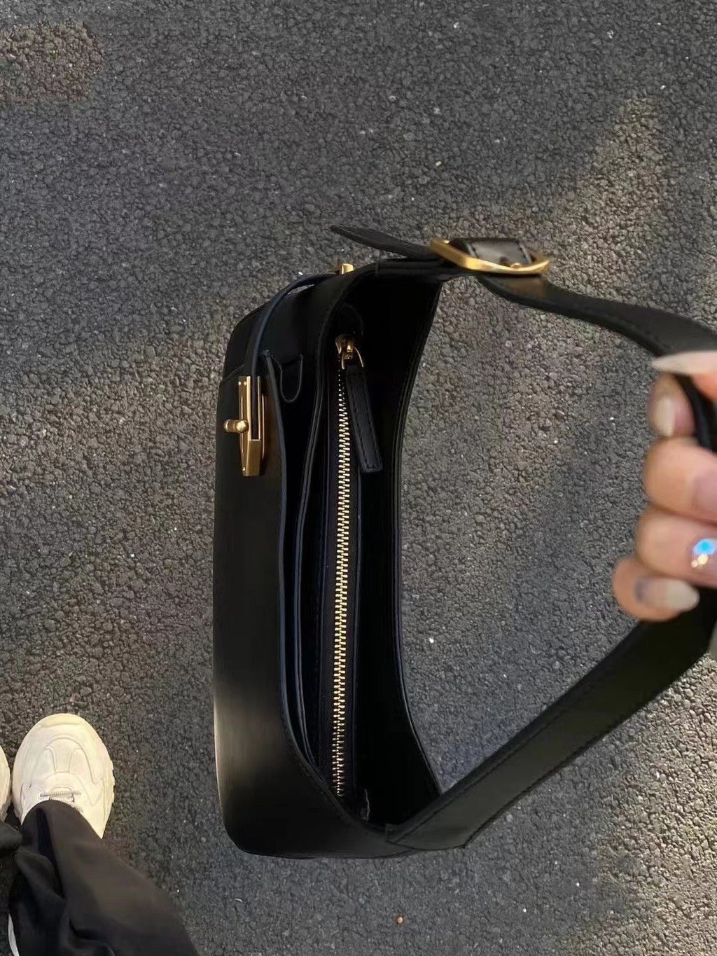 Minimalist Crescent Shoulder Bag with Buckle Accent and Adjustable Strap