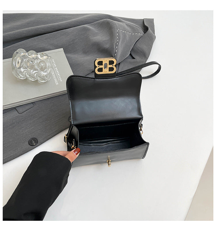 The Monogram Emblem Top-Handle Mini Bag