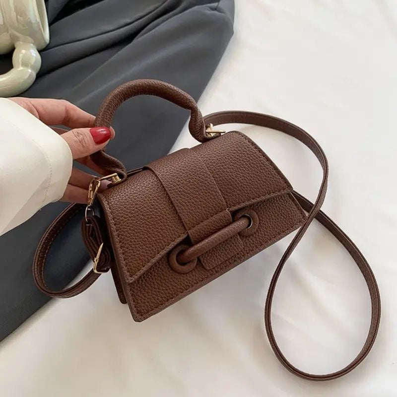 Mini Textured Leather Top-Handle Bag – Micro Crossbody Purse with Belt Buckle Accent
