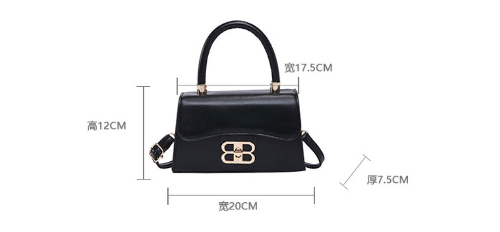The Monogram Emblem Top-Handle Mini Bag