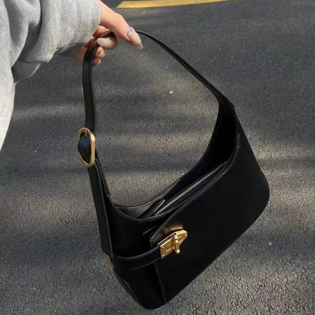 Minimalist Crescent Shoulder Bag with Buckle Accent and Adjustable Strap