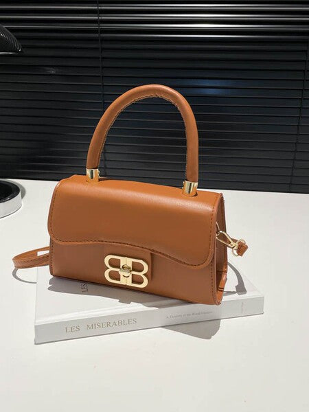 The Monogram Emblem Top-Handle Mini Bag