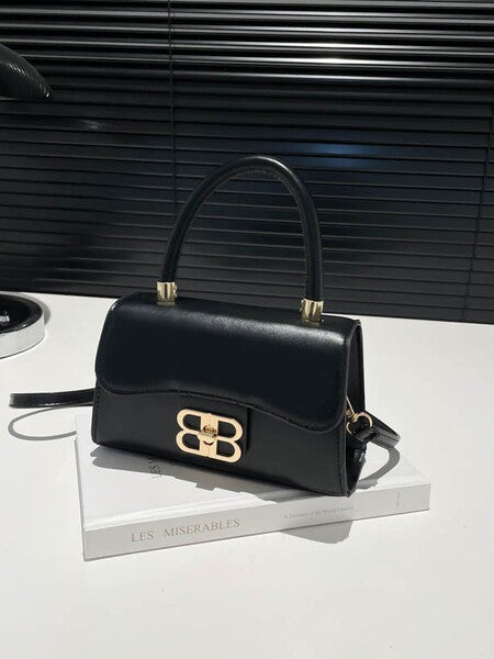 The Monogram Emblem Top-Handle Mini Bag