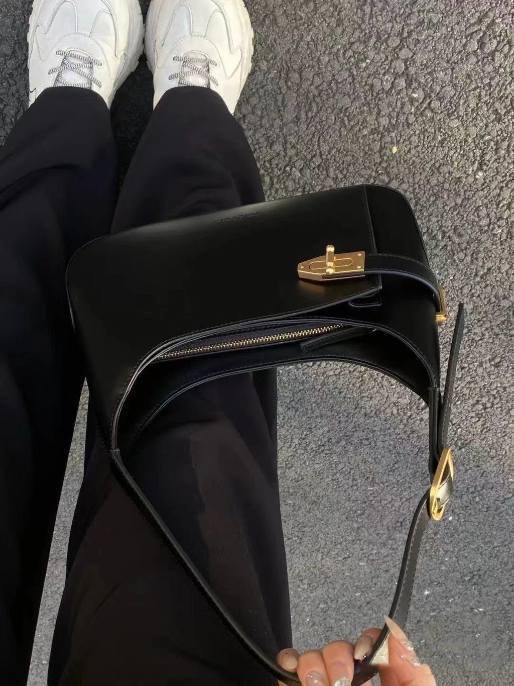 Minimalist Crescent Shoulder Bag with Buckle Accent and Adjustable Strap