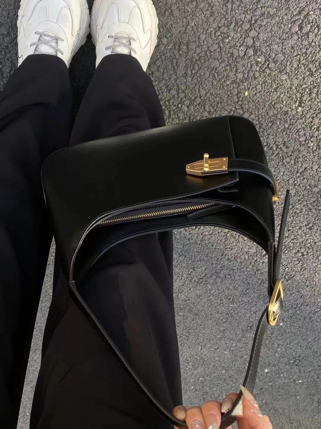 Minimalist Crescent Shoulder Bag with Buckle Accent and Adjustable Strap