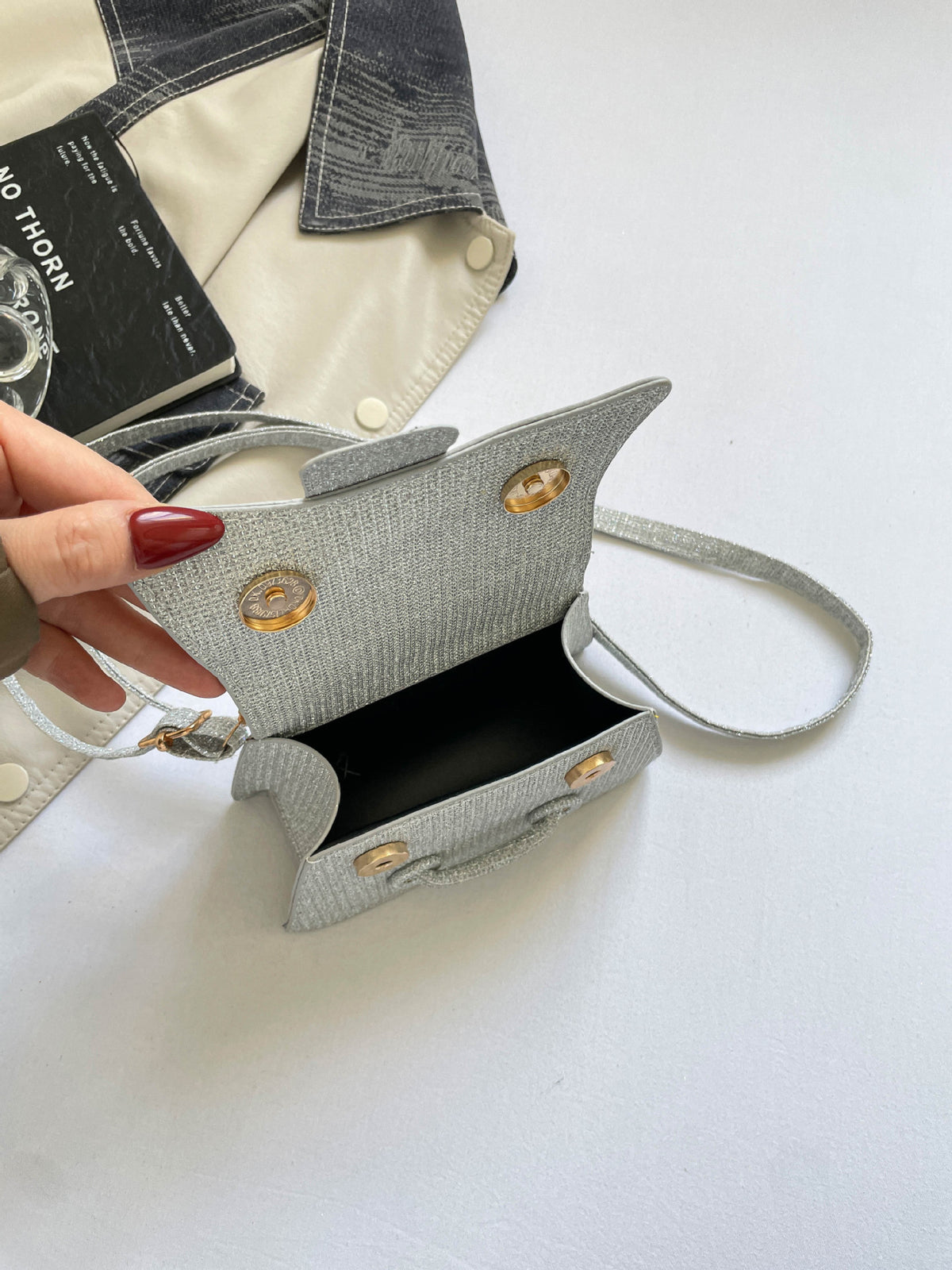 Sparkling Mini Textured Leather Top-Handle Bag – Micro Crossbody Purse with Belt Buckle Accent